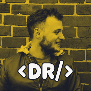 A photograph of dr dinomight with the DR symbol overlaid, which is encased in code brackets. The image is tinted yellow and he is against a brick background.